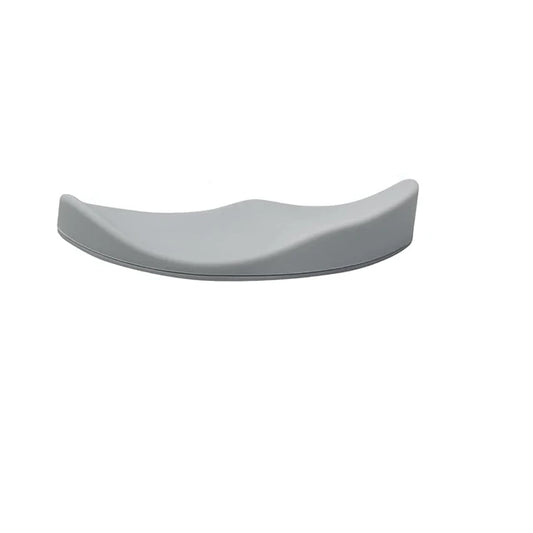 Gliding ergonomic wrist rest for right-handed mouse use