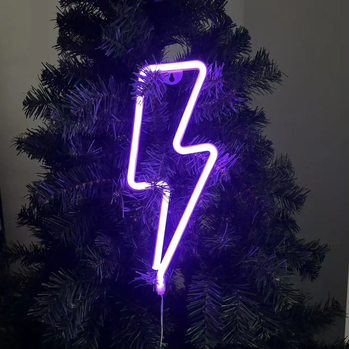 Lightning bolt neon light in purple