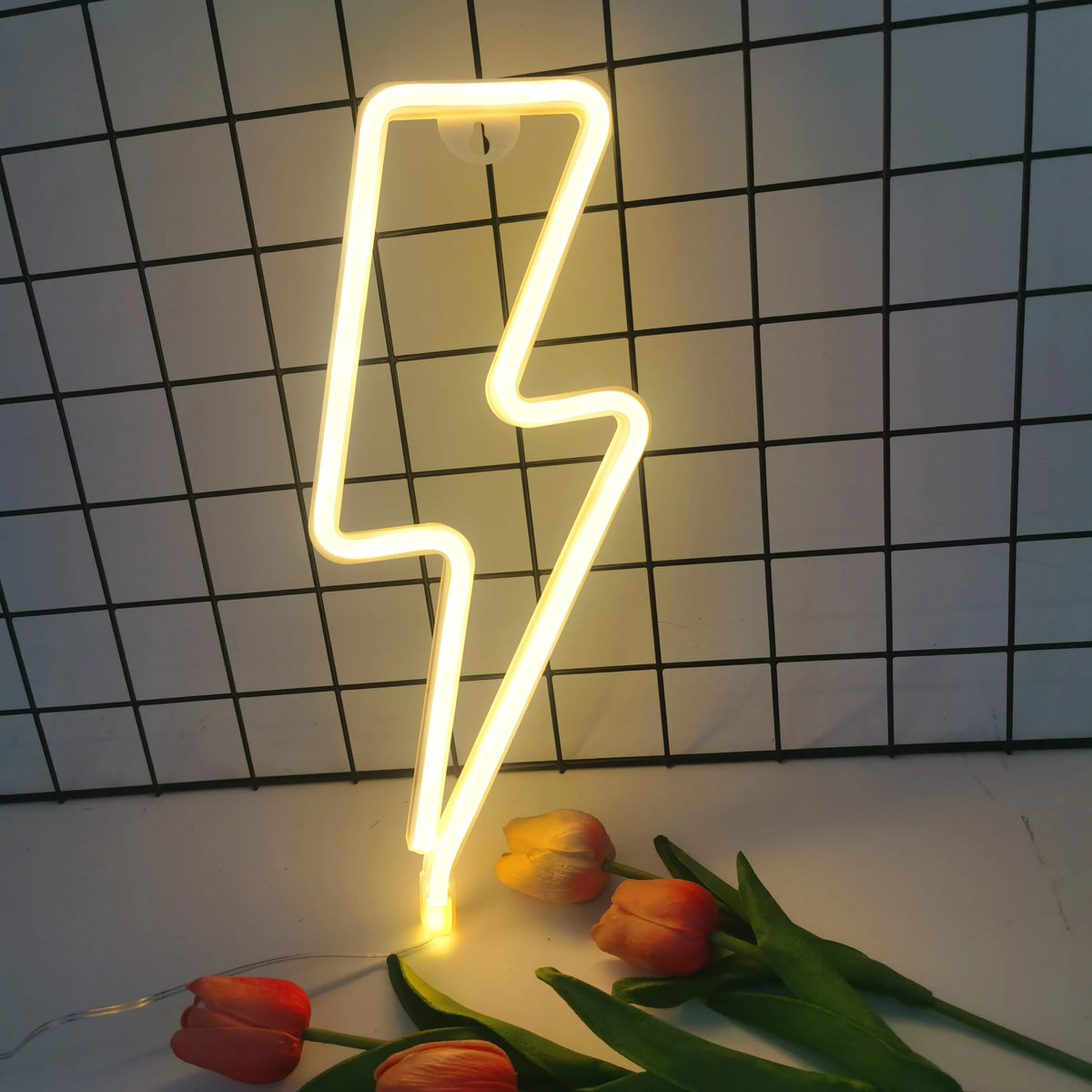 Lightning bolt LED neon light glowing warm yellow