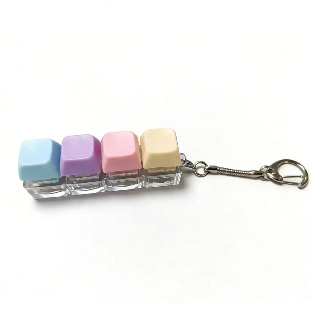 Mechanical keyboard key fidget clicker on a keychain