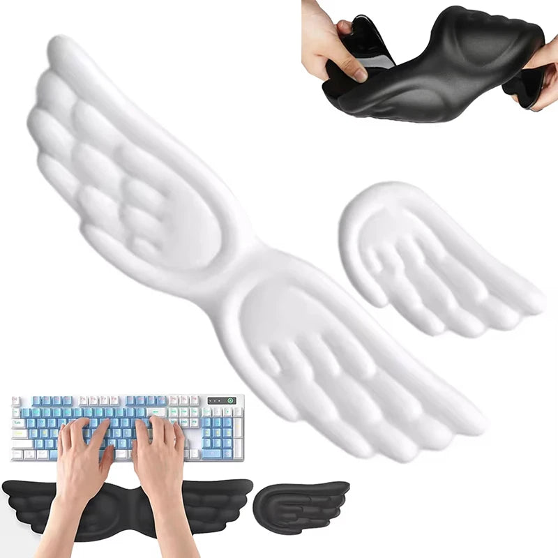 Black and white angel wing wrist rests placed in front of a keyboard
