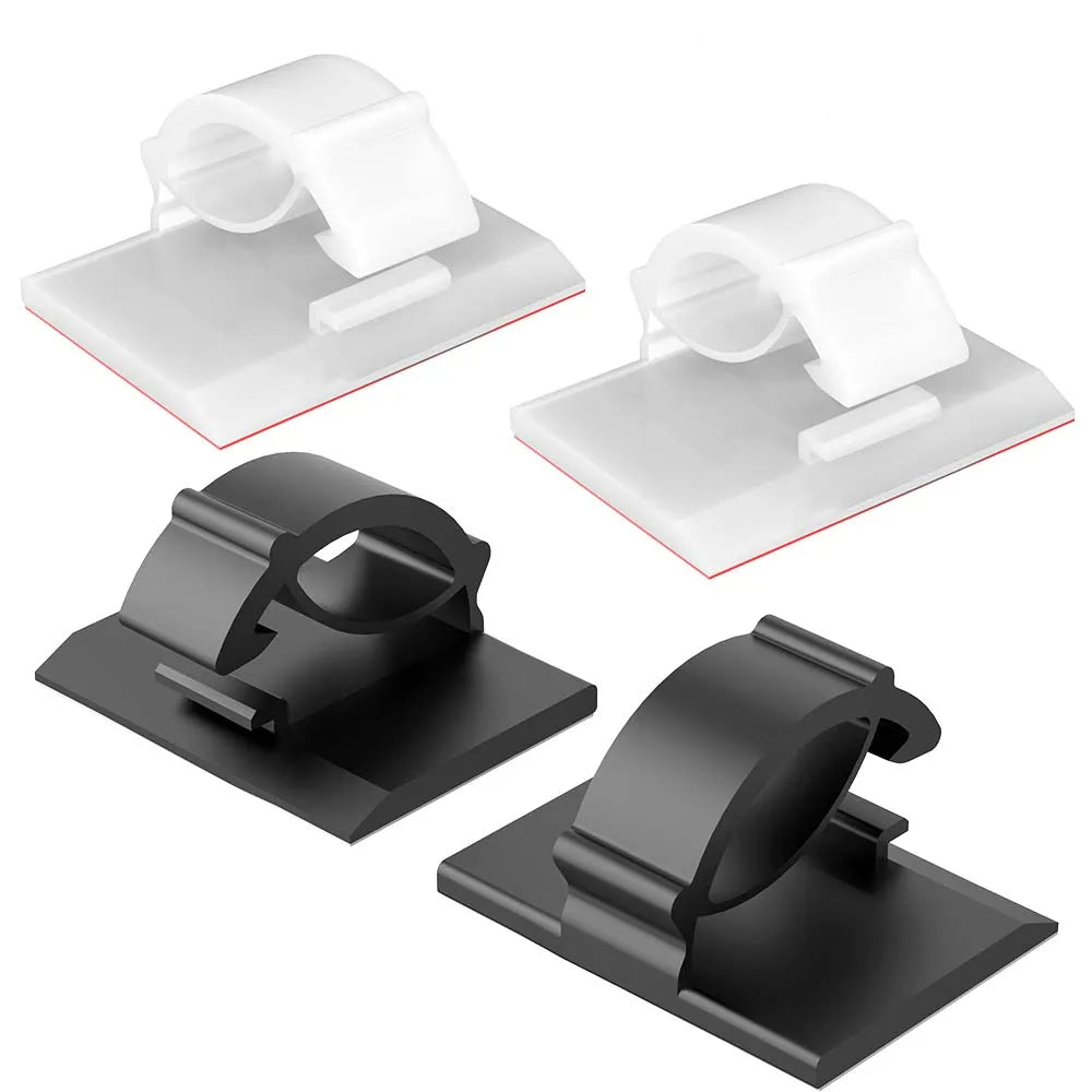 Adhesive desk cable organizer clips holding USB cables