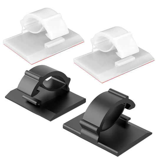 Adhesive desk cable organizer clips holding USB cables