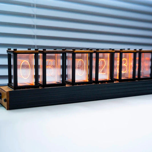 Walnut-finish nixie-style clock showing six glowing digits, front view