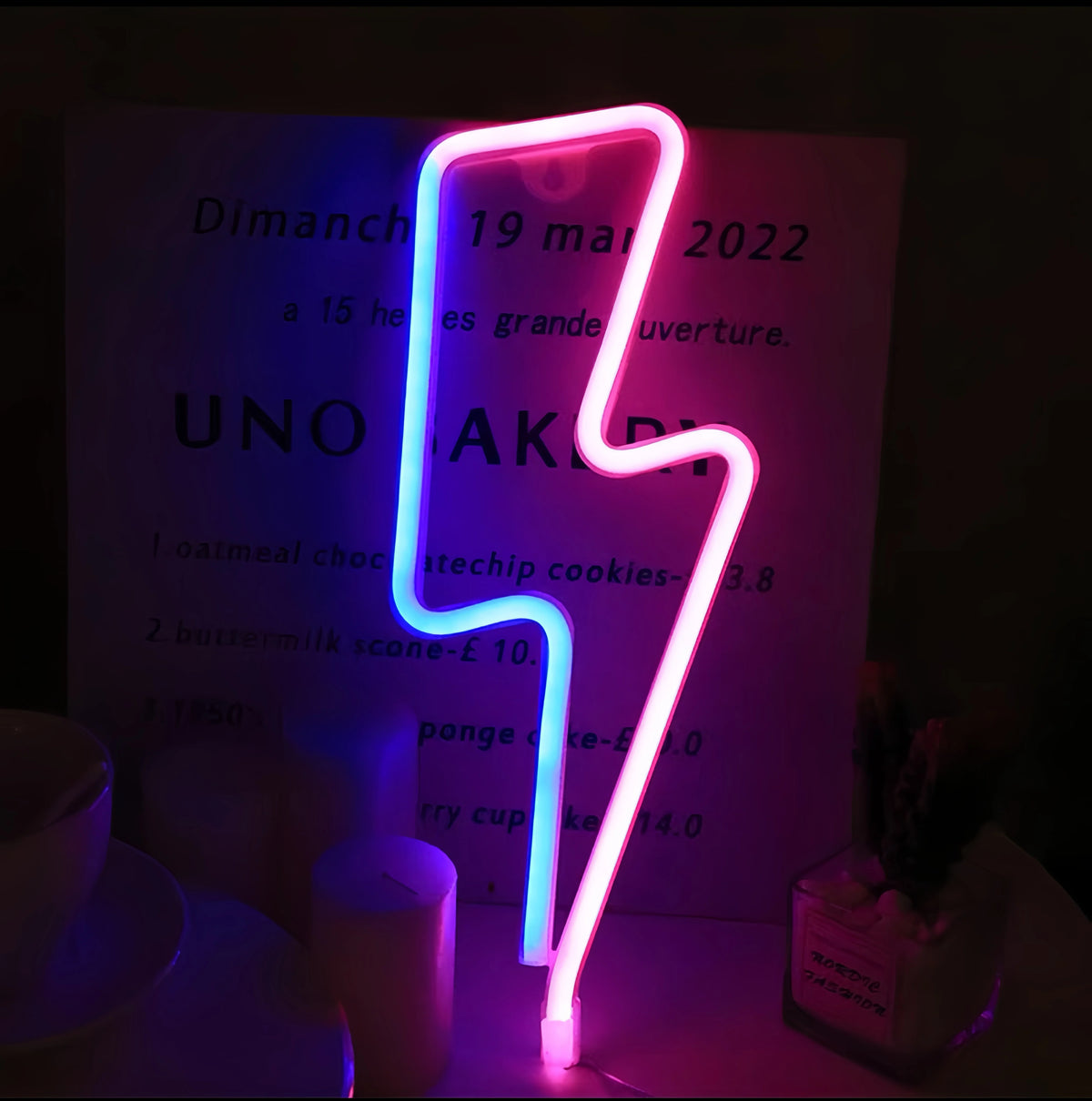 Lightning bolt LED neon light glowing purple-pink
