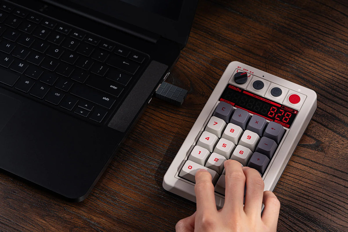 8BitDo Retro 18 mechanical numpad with its seven-segment calculator display