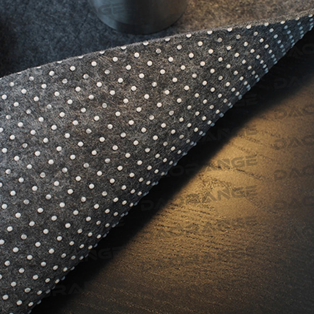 Gray felt desk mat under a keyboard and mouse on a desk