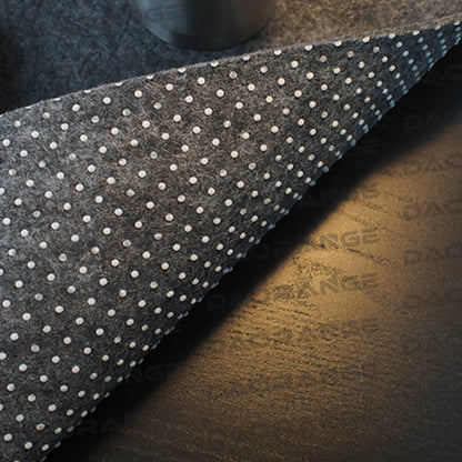 Gray felt desk mat under a keyboard and mouse on a desk