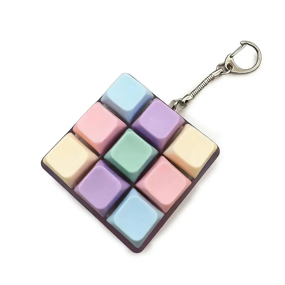 Mechanical keyboard key fidget clicker on a keychain