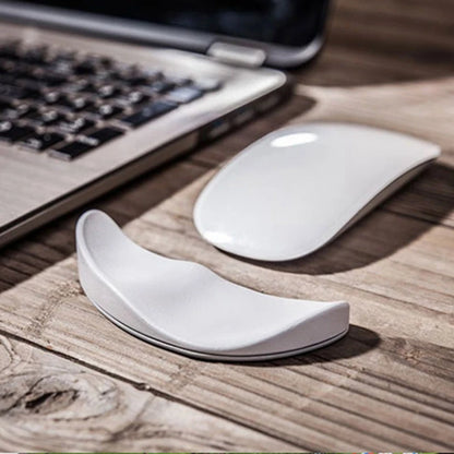 Gliding ergonomic wrist rest for right-handed mouse use, shown in white