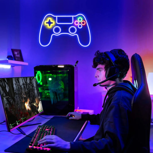 Controller neon sign lit up in a gaming room
