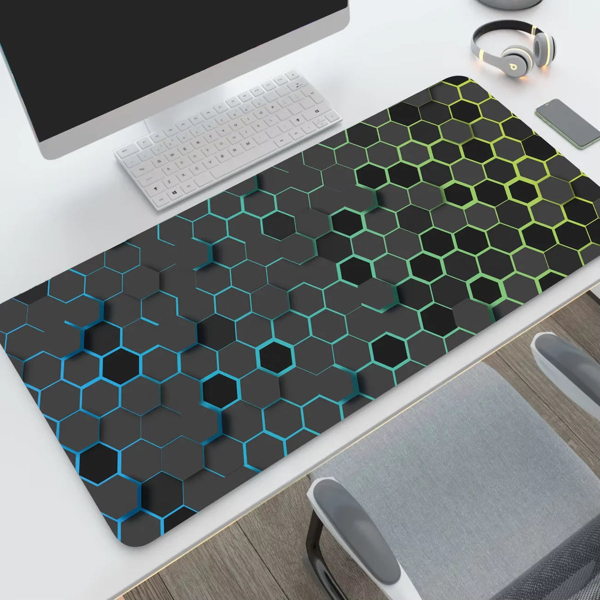 Hexagon desk mat, grey and blue design, on a desk